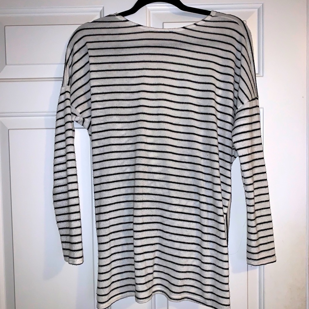 Vestique criss cross sweater